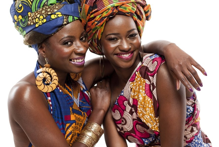 Young beautiful African fashion models in traditional dress.